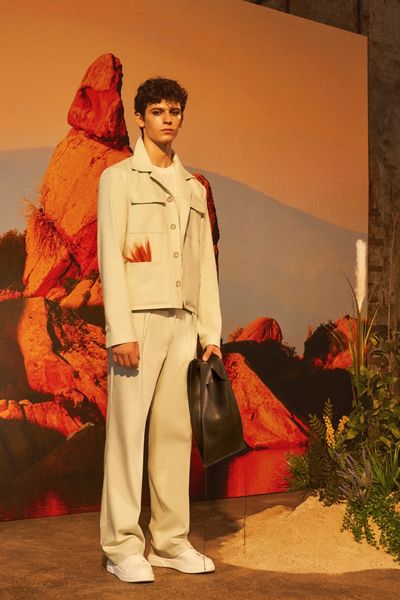 Manu Rios wears Louis Vuitton Man About Town SS22